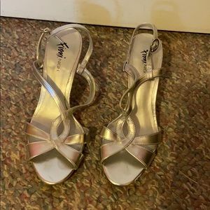 Silver strappy heals.